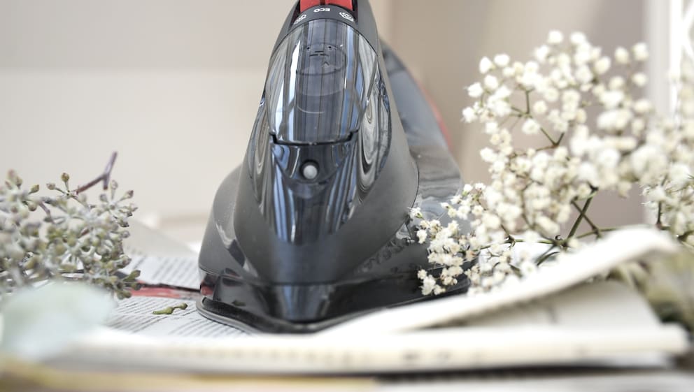 I use the iron to dry and smooth the flowers.
