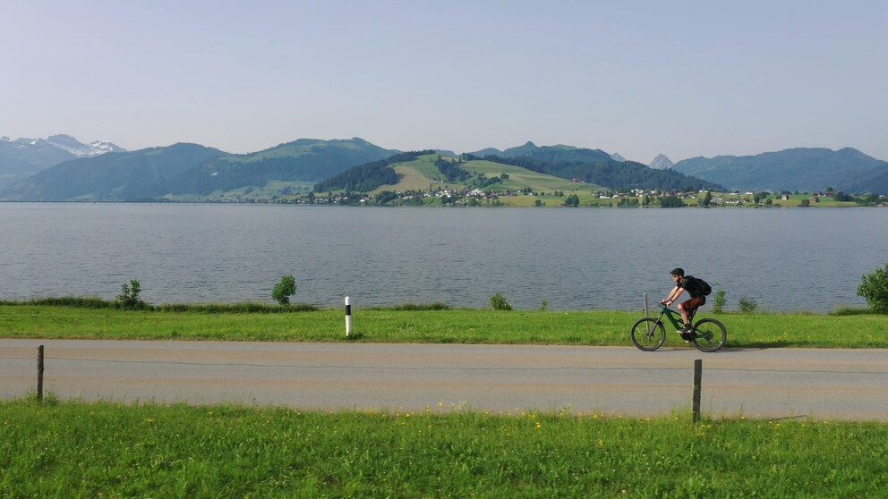 The hilly landscape around Sihlsee. Marius from the Pedalato series on the identical bike.