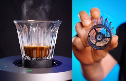The coffee flows in through a valve at the bottom of the cup.