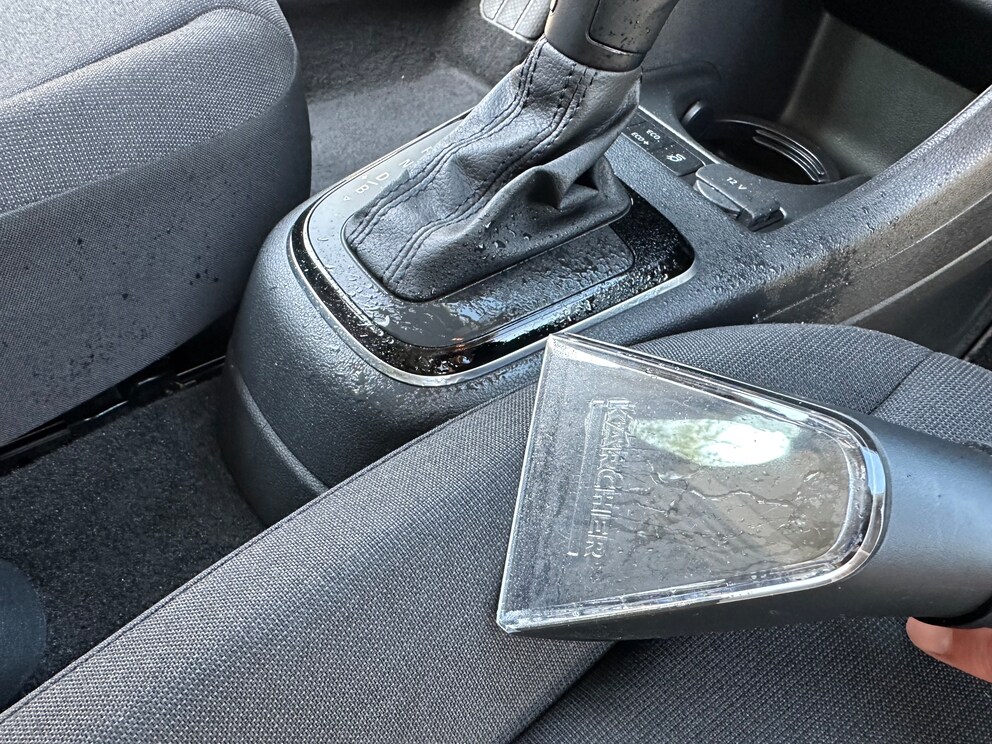 I’ve got to be careful when using the upholstery nozzle on curved surfaces. Not taking enough care here, I splashed cleaning solution on the centre console.