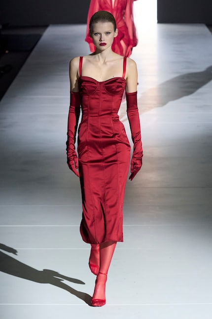Dolce & Gabbana’s Winter 23 collection paired red tights with red, strappy sandals.