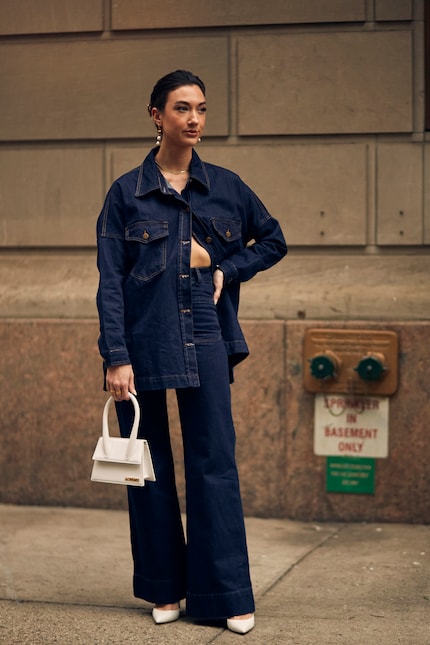 Stiff denim shirts are hard to tuck into trousers – they look their best when worn half-buttoned over jeans.