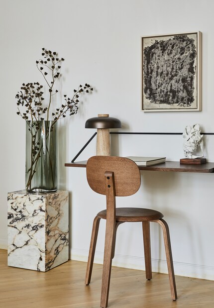 Murals, plants and flowers are good ways to make the workspace feel homier.