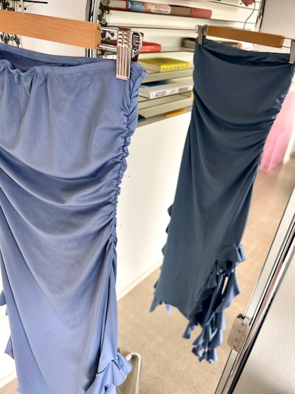 Pas vraiment haut de gamme, mais tolérable : la robe bandeau grise de Temu.