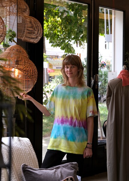 The rattan lampshades in the shape of a snail shell were created in a village in Vietnam.