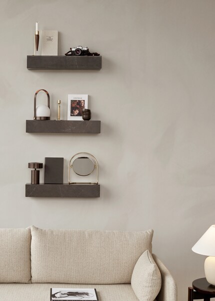 Associated with noble materials, stacks of magazines immediately look more stylish. 