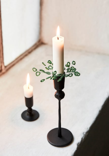 Green beads replace the fir greenery in this DIY wreath.