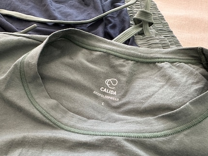 The shirt features the new logo.