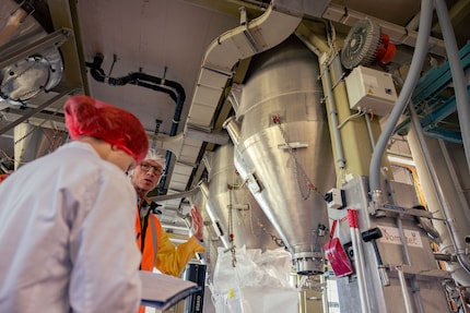 The pipes feed more ingredients into the Aromat tank.