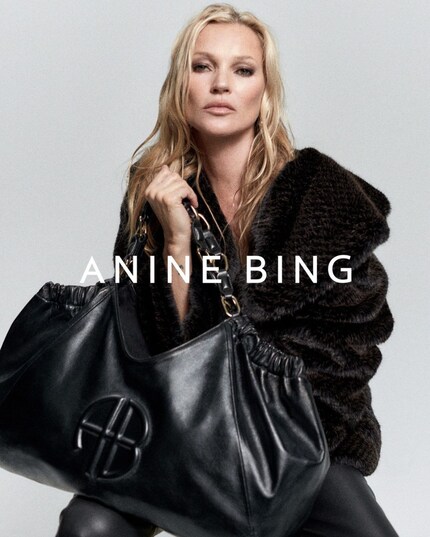 The supermodel with the «Kate Tote» which is named after her.
