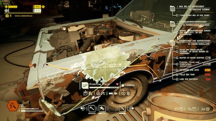 Dans le garage, je retape ma voiture.