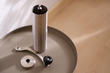 The hand grinder is almost completely made of metal.