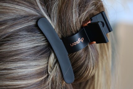 The style’s held in place.