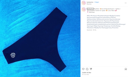 The thongs have a simple design and feature a small logo on the right.