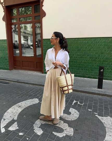 The Birkenstock clog goes just as well with a dress ...