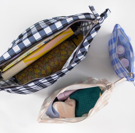 Les pochettes pratiques de Kind Bag permettent de mettre de l’ordre dans vos accessoires.