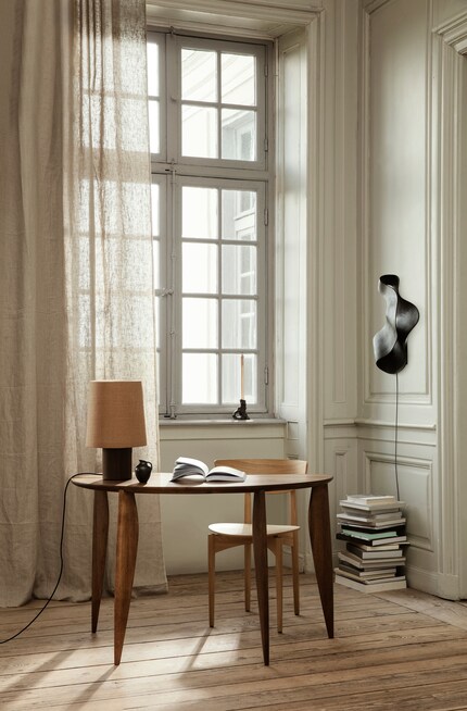 Ob an- oder ausgeschaltet – die «Oyster»-Wandlampe wirkt wie Kunst. 