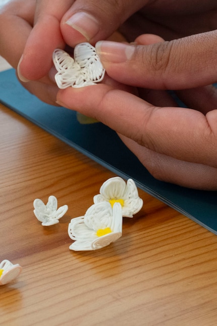 As long as the plastic’s still warm, I can shape the objects.