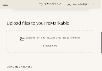 I use the website to drag and drop files onto the tablet.