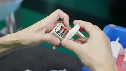 The cover is put on in the last step, as here with a similar product.