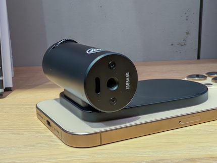USB connection and tripod thread.