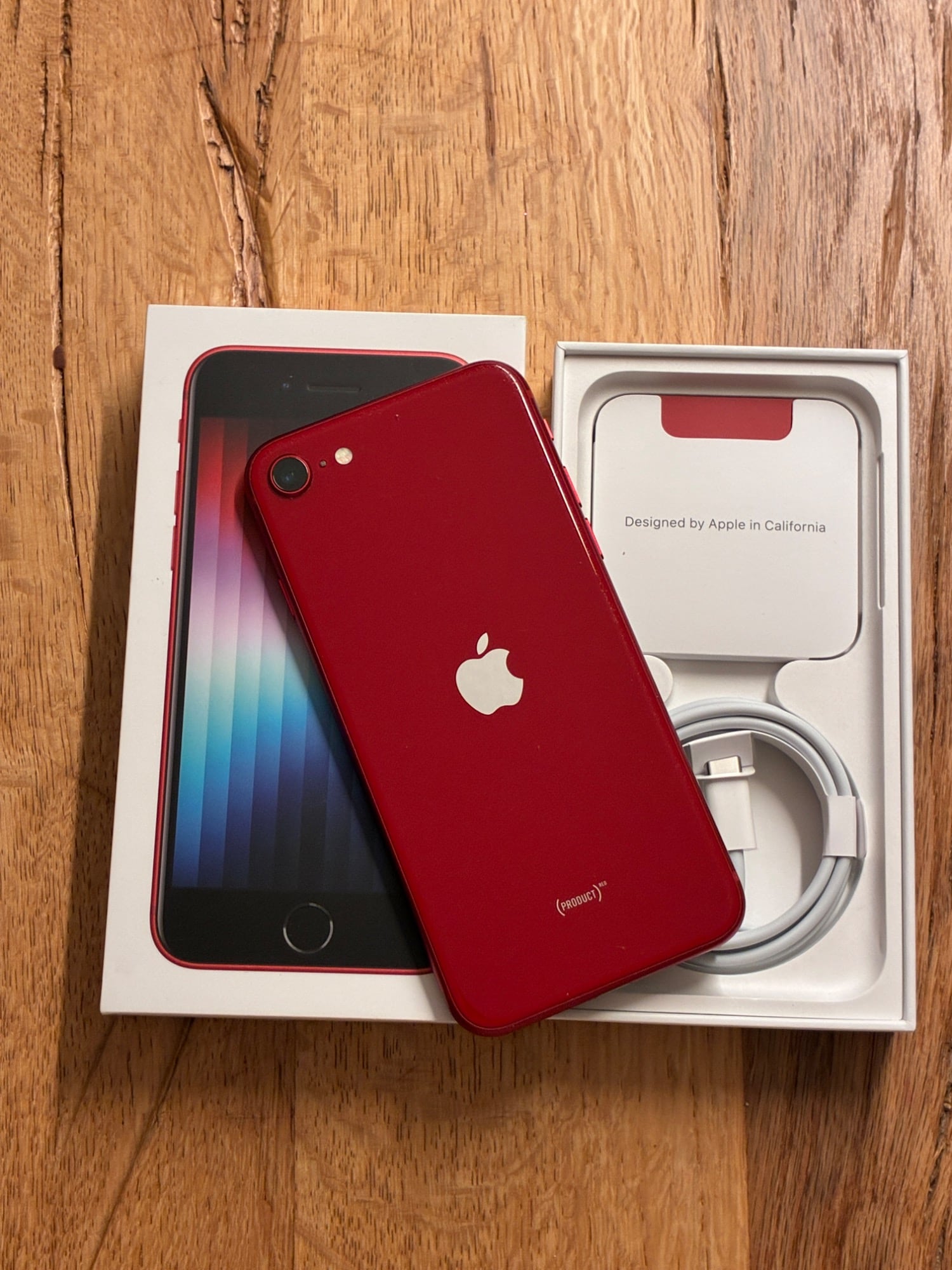 Produktbild Apple iPhone SE (3rd Gen) (64 GB, (PRODUCT)​RED, 4.70", SIM + eSIM, 12 Mpx, 5G)