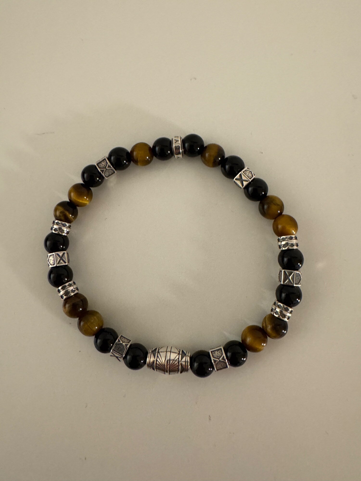 Immagine prodotto Thomas Sabo Braccialetto con perline di onice nera e occhio di tigre in argento (17 cm, Annerito, Argento 925)
